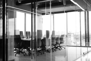 grayscale photography of corporate room
